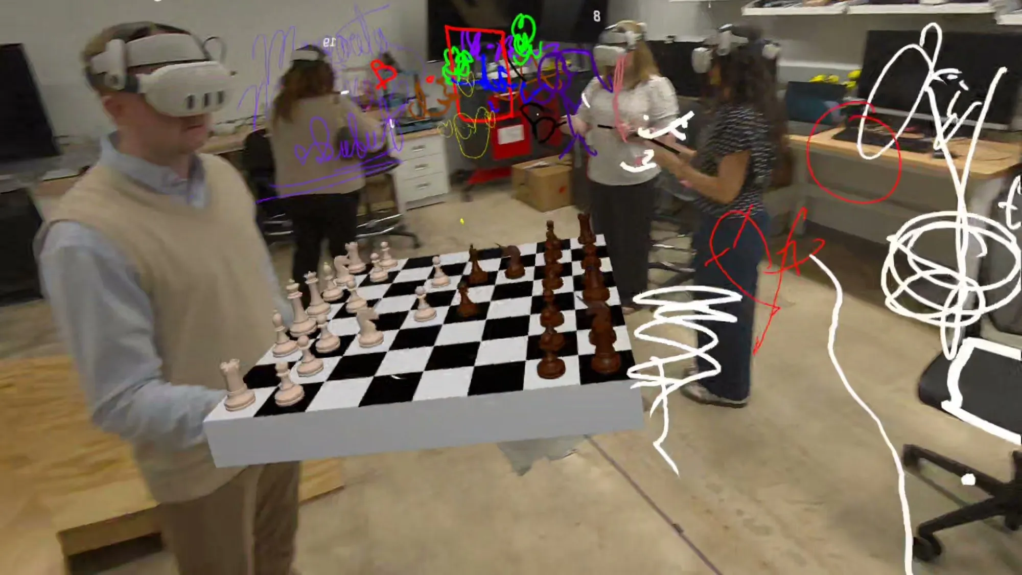 A group in headsets gathered around a virtual chessboard surrounded by mid-air sketches.